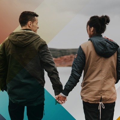 A man and a woman holding hands