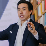 A man speaking to an audience